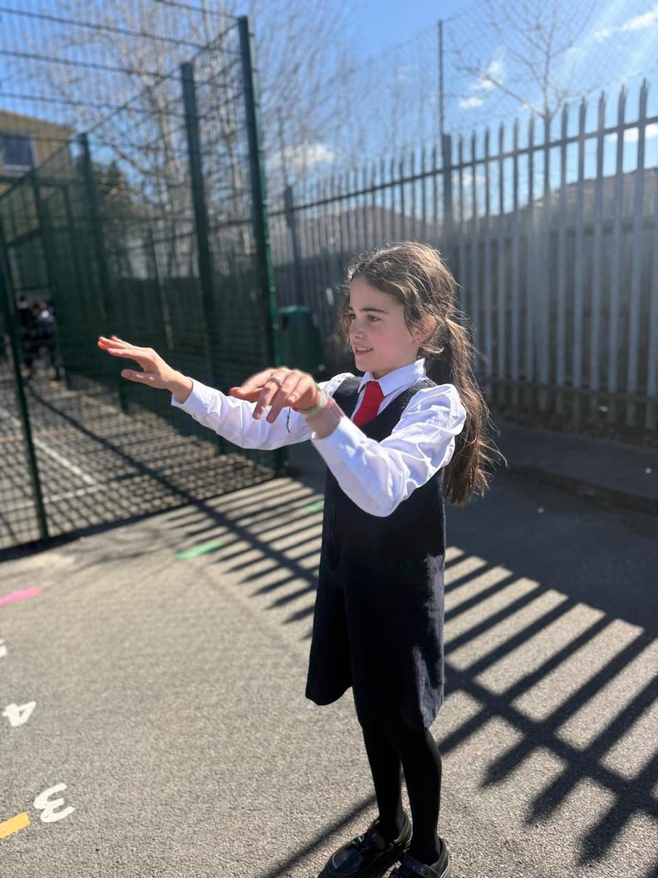 A pupil enjoys a playground game at break time.