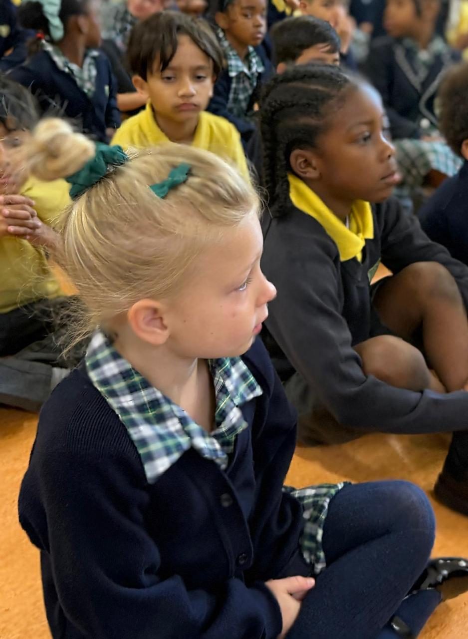 Pupils gather together for a whole-school assembly.