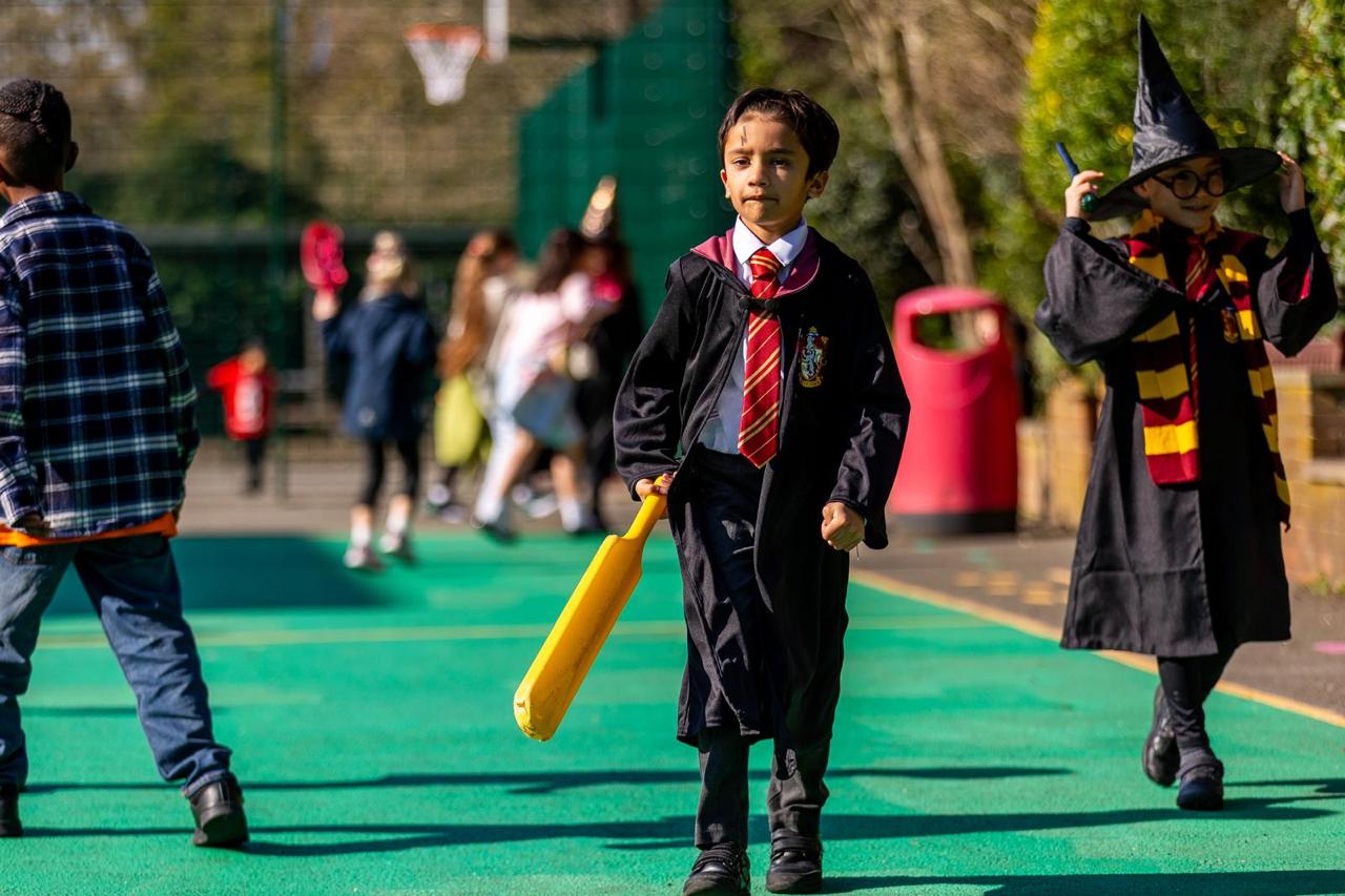 Pupils dressed as book characters in the playground on World Book Day at Vita et Pax