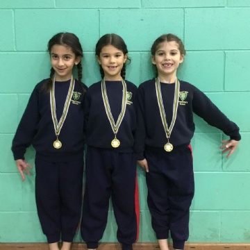 girls wearing medals