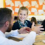 teacher talking to a student