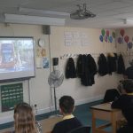 students watching a presentation